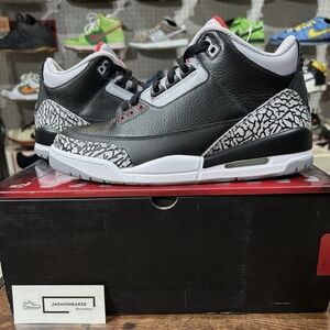 Black and Gray Sneakers with Red Accents